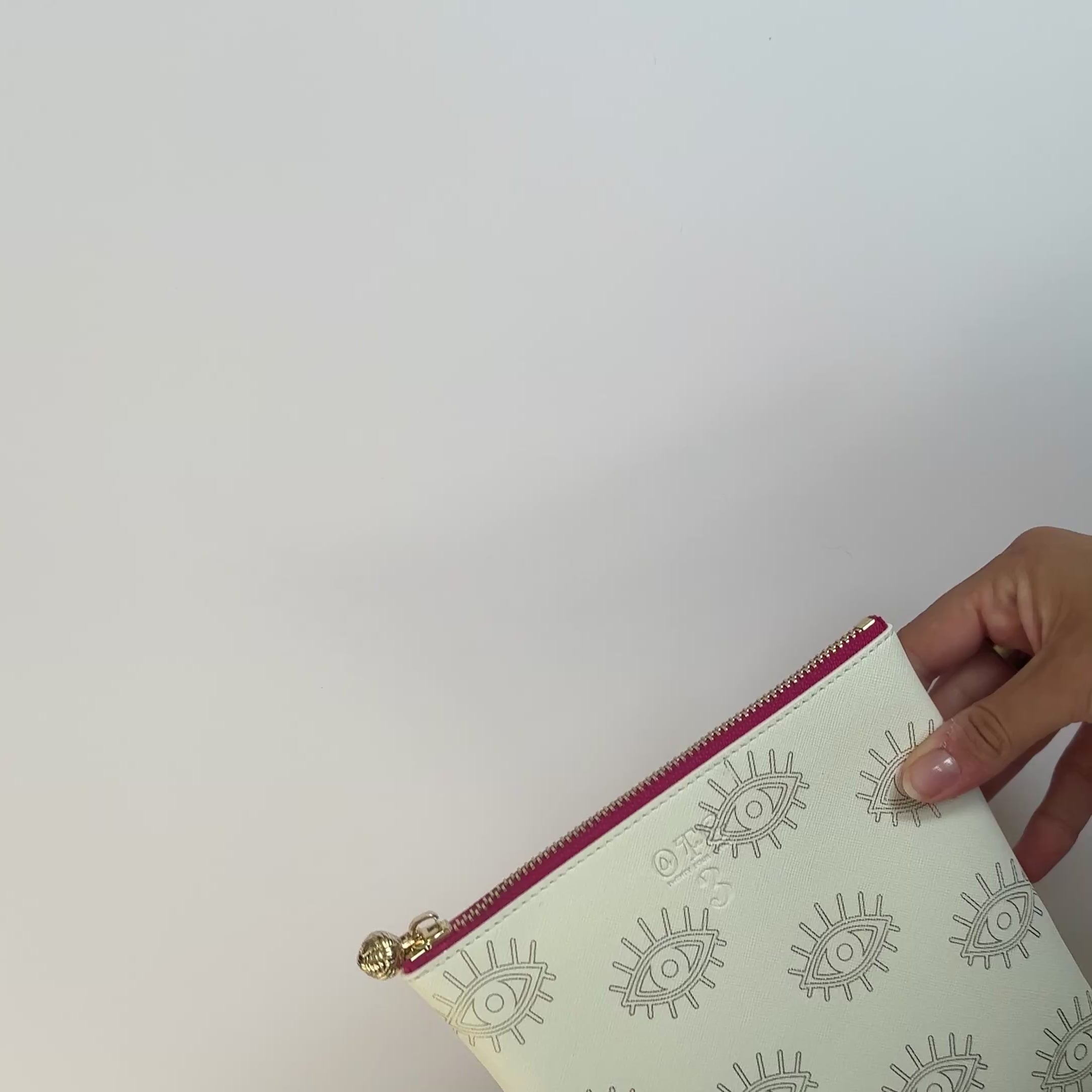 Load video: #3 Sabra Eye White Pouch